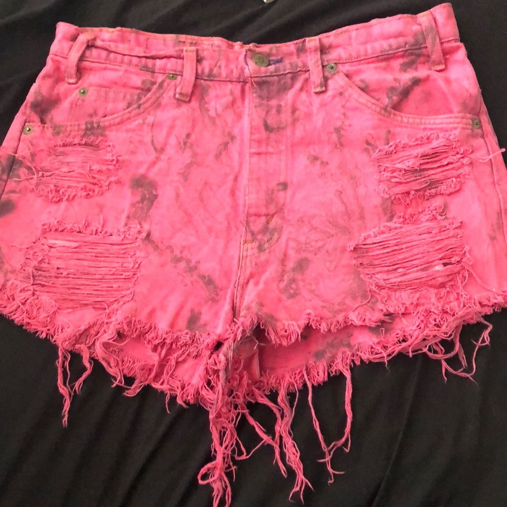 Hot pink high waisted distressed shorts
